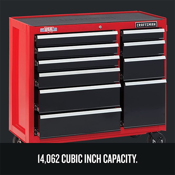 Tool cabinet with drawer lining roll and sleeve organizer